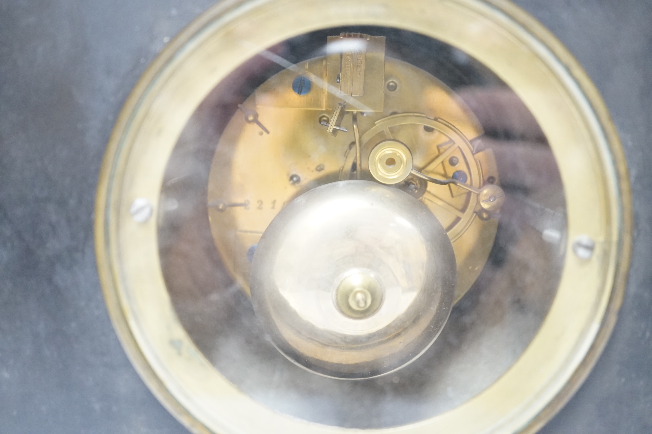 A black slate and marble mantle clock, 6.5cm high